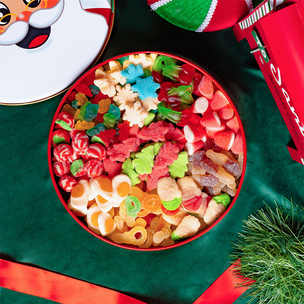 Wunnie Bucket Happy Holidays con composizione d'esempio di caramelle natalizie