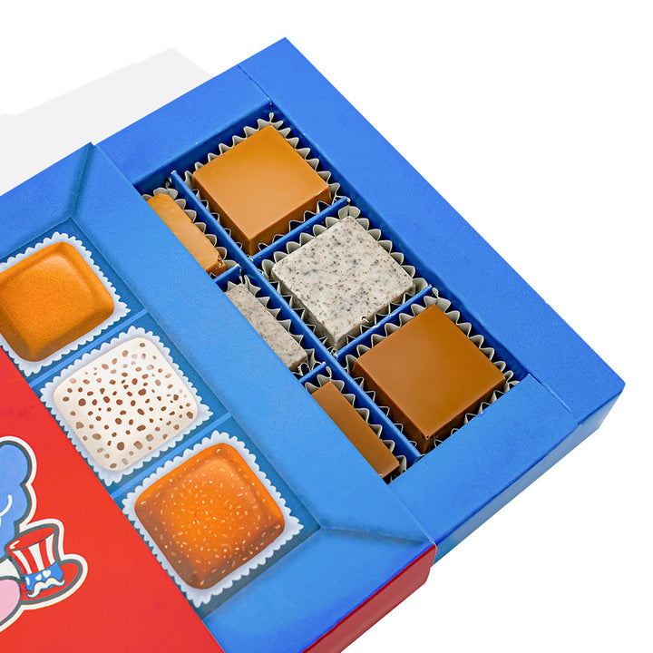 Choco Love Box, kutija od 12 miješanih čokoladnih pralina punjenih maslacem od kikirikija, toffeejem i cookies & cream od 130g 